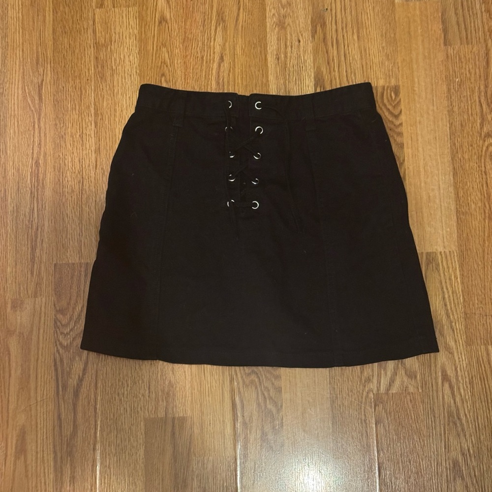 Forever 21 Black denim skirt with criss cross tie up detail in the middle